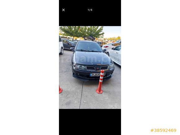 Sahibinden Mitsubishi Carisma 1.8 GDI Elegance 2001 Model.  2001 model  1.8 otomatik motor şanzuman sıfır orijinal 280 binde ful paket sanruf hız sabi