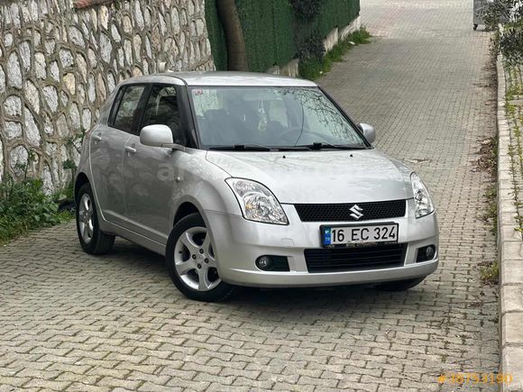 searu•*¨*•.¸♬︎ Galeriden Suzuki Swift 1.5 AT 2007 Model İzmir 151.000 km Gri