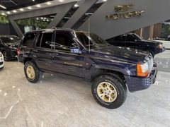 1998 GRAND CHEROKEE 5.2 LİMİTED BEJ TORPİDO NADİR TEMİZLİKTE