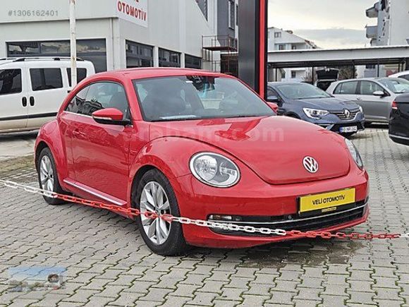 36ay Kredili 2012 BEETLE 1.2tsi DESİGN 105ps ATEŞ KIRMIZI.......
