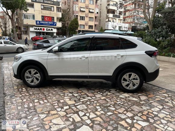 BEYAZ MELEK TAİGO 1.0 TSİ 116HP-DSG TIPRONIC-YARI OTONOM ACC