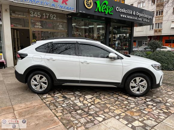 BEYAZ MELEK TAİGO 1.0 TSİ 116HP-DSG TIPRONIC-YARI OTONOM ACC