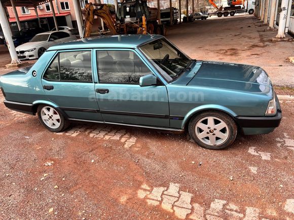 1993slx motor sıfır yapıldı kapı içleri direklerde çürük yok  1degisen sağ ön çamurluk güneş solmasın dan dolayı komple boyalı detaylar d.m den