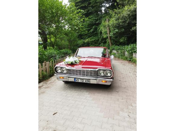 FİLM DİZİ DÜĞÜNLERE ŞOFÖRLÜ KİRALIK 1964 MODEL KIRMIZI IMPALA