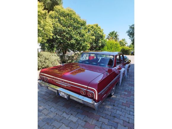 FİLM DİZİ DÜĞÜNLERE ŞOFÖRLÜ KİRALIK 1964 MODEL KIRMIZI IMPALA