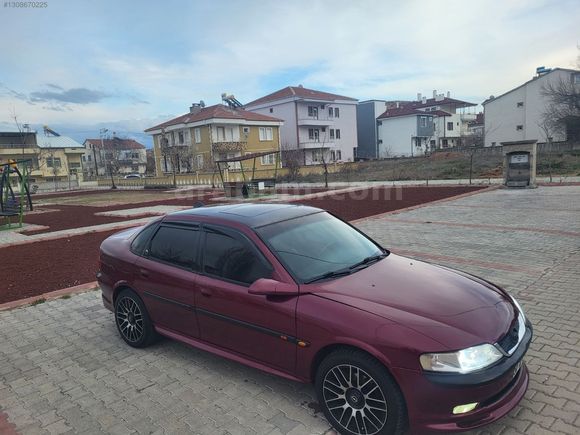 97 model vectra CD cam gibi tertemiz