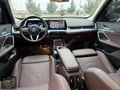 BOSS MOTORS 2024 BMW İX1 X LİNE CAM TAVAN DERİ KOLTUK 18.000 KM