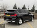 BOSS MOTORS 2024 BMW İX1 X LİNE CAM TAVAN DERİ KOLTUK 18.000 KM