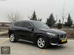 BOSS MOTORS 2024 BMW İX1 X LİNE CAM TAVAN DERİ KOLTUK 18.000 KM