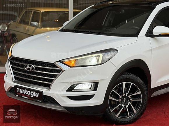 TÜRKOĞLUOTOMOTİV~TUSCON~1.6CRDİ~4X4~CAMTAVAN~NVGSYN~KLTKISITMA