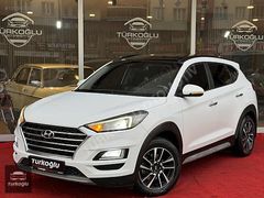 TÜRKOĞLUOTOMOTİV~TUSCON~1.6CRDİ~4X4~CAMTAVAN~NVGSYN~KLTKISITMA