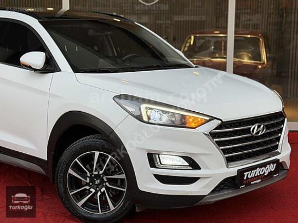 TÜRKOĞLUOTOMOTİV~TUSCON~1.6CRDİ~4X4~CAMTAVAN~NVGSYN~KLTKISITMA