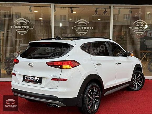 TÜRKOĞLUOTOMOTİV~TUSCON~1.6CRDİ~4X4~CAMTAVAN~NVGSYN~KLTKISITMA