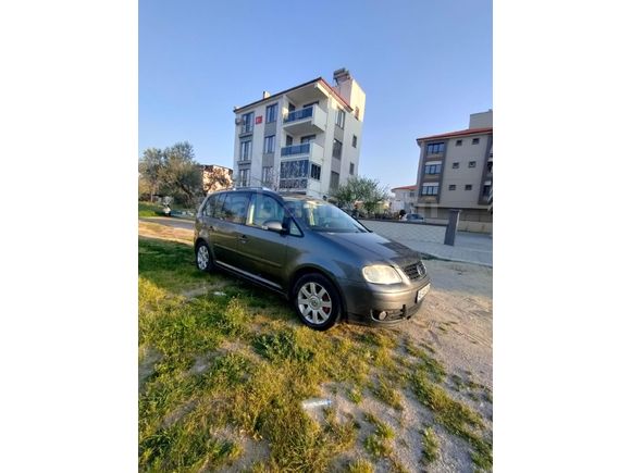 Volkswagen Touran hatasız en dolusu