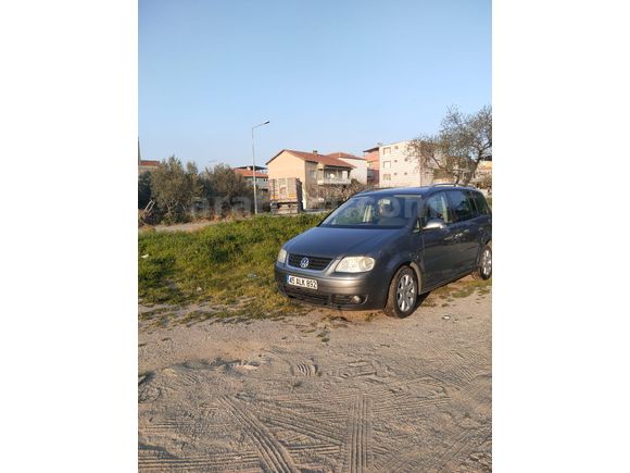 Volkswagen Touran hatasız en dolusu
