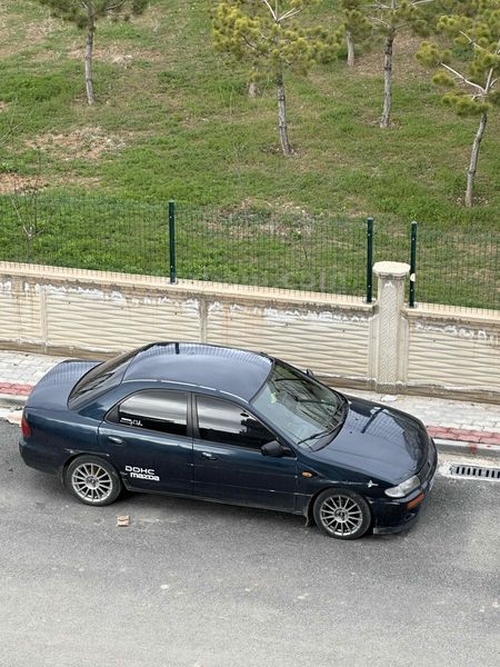 Sahibinden Mazda 323 1.8 Familia 1996 Model Konya 300.000 km Mavi