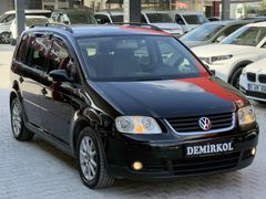 2OO4+EMSALSİZ+6 İLERİ+TOURAN 1.6 FSİ COMFORT+İÇİ GRİ+PARK SENSÖR