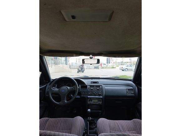 SSS CARS TAN 1995 MODEL FORD-ESCORT