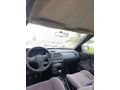 SSS CARS TAN 1995 MODEL FORD-ESCORT