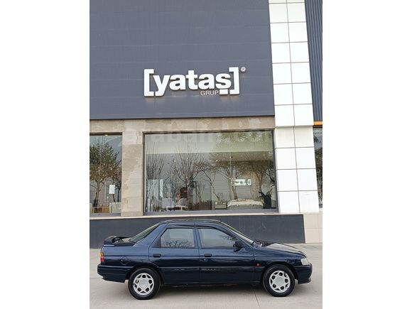 SSS CARS TAN 1995 MODEL FORD-ESCORT