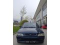 SSS CARS TAN 1995 MODEL FORD-ESCORT