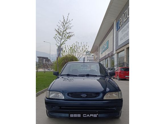 SSS CARS TAN 1995 MODEL FORD-ESCORT