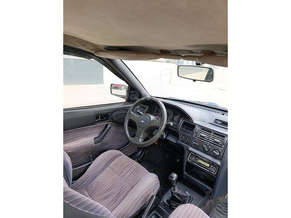 SSS CARS TAN 1995 MODEL FORD-ESCORT