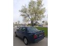 SSS CARS TAN 1995 MODEL FORD-ESCORT