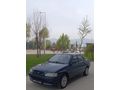 SSS CARS TAN 1995 MODEL FORD-ESCORT