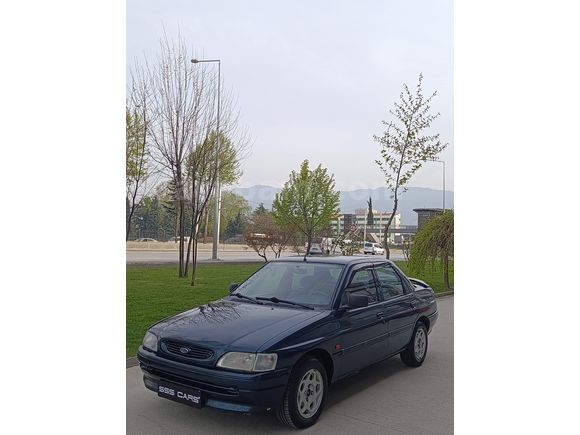 SSS CARS TAN 1995 MODEL FORD-ESCORT