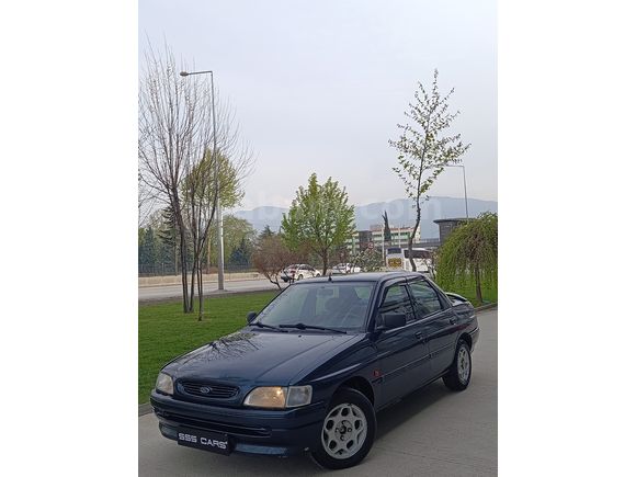 SSS CARS TAN 1995 MODEL FORD-ESCORT