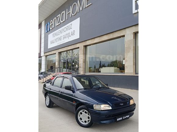 SSS CARS TAN 1995 MODEL FORD-ESCORT