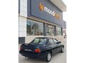 SSS CARS TAN 1995 MODEL FORD-ESCORT