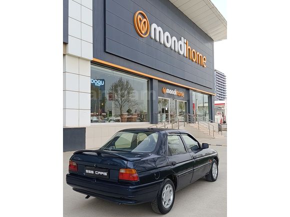 SSS CARS TAN 1995 MODEL FORD-ESCORT