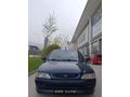 SSS CARS TAN 1995 MODEL FORD-ESCORT