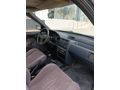 SSS CARS TAN 1995 MODEL FORD-ESCORT