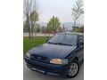 SSS CARS TAN 1995 MODEL FORD-ESCORT