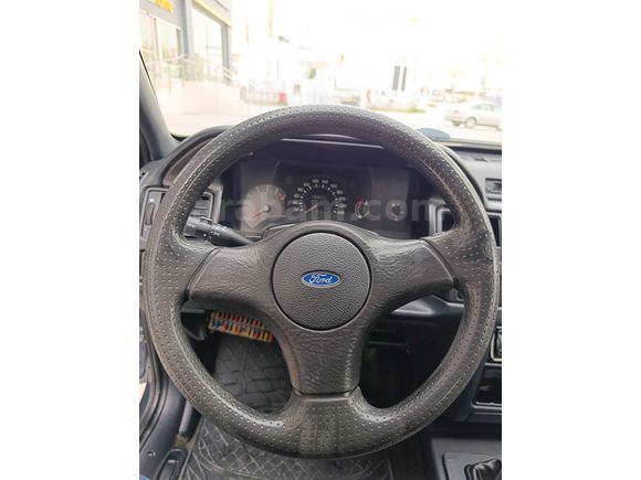 SSS CARS TAN 1995 MODEL FORD-ESCORT
