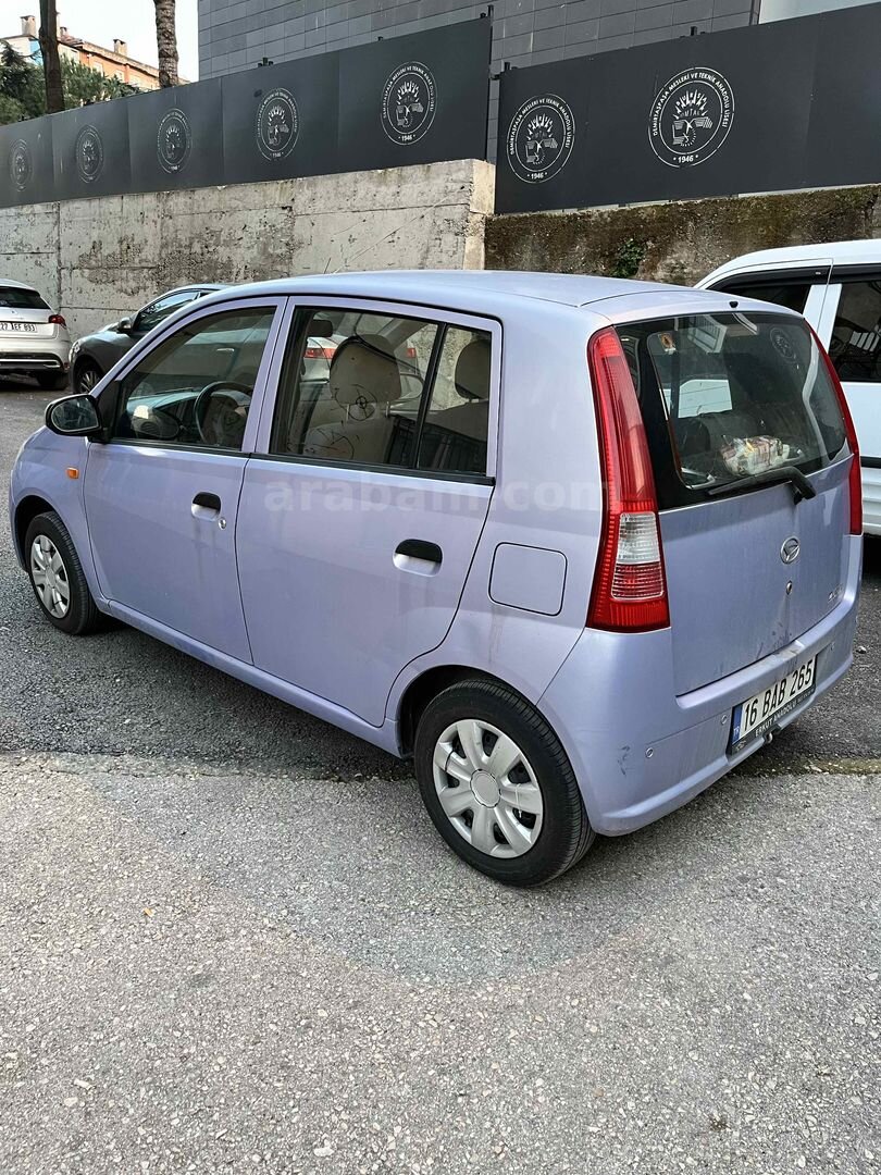 Sahibinden Daihatsu Cuore 1.0 Low Grade 2005 Model Bursa 154.500 km Mor 3