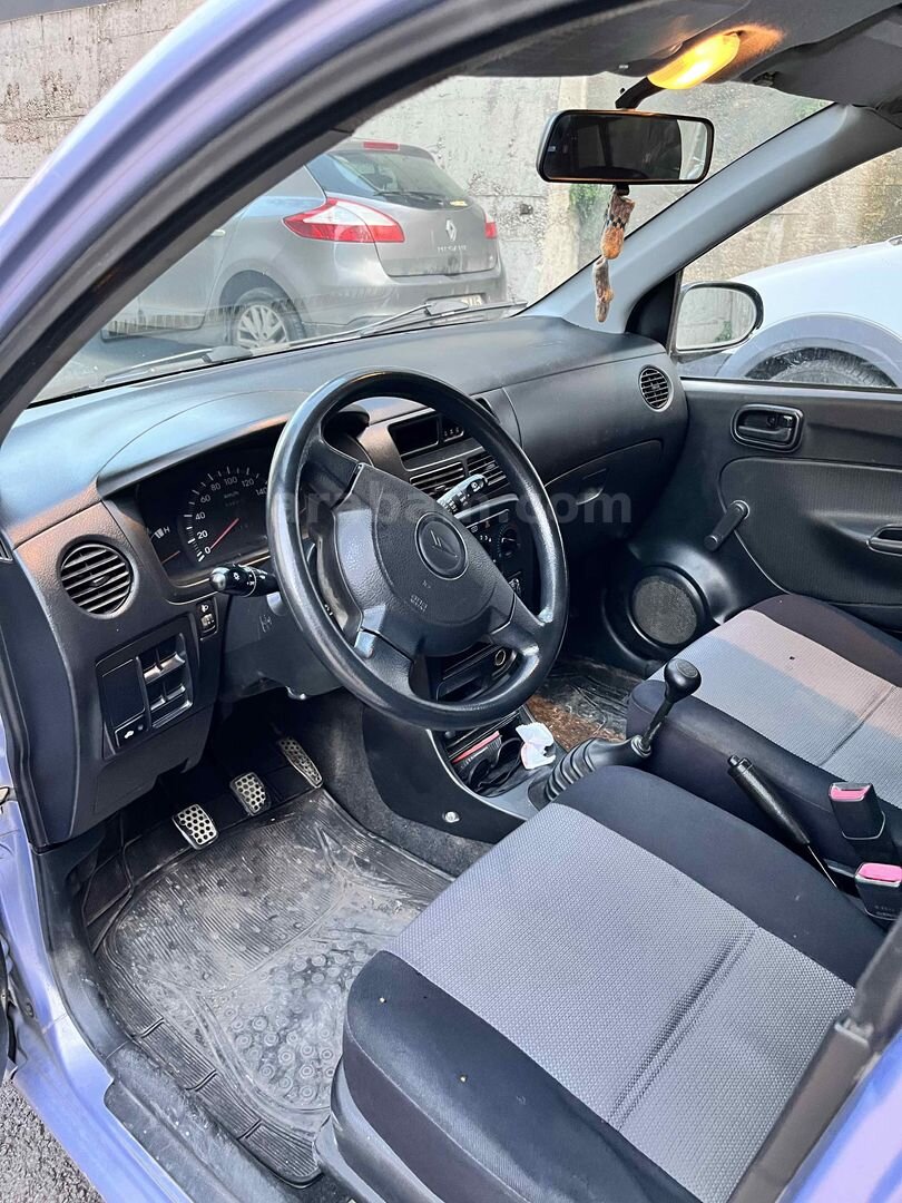 Sahibinden Daihatsu Cuore 1.0 Low Grade 2005 Model Bursa 154.500 km Mor 7