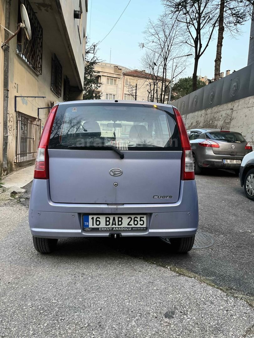 Sahibinden Daihatsu Cuore 1.0 Low Grade 2005 Model Bursa 154.500 km Mor 2