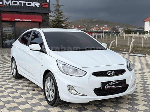 GRL MOTORS'TAN 88.000 ACCENT BLUE