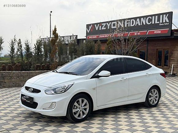GRL MOTORS'TAN 88.000 ACCENT BLUE