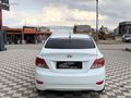 GRL MOTORS'TAN 88.000 ACCENT BLUE