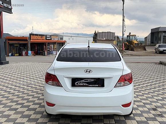 GRL MOTORS'TAN 88.000 ACCENT BLUE