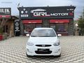 GRL MOTORS'TAN 88.000 ACCENT BLUE
