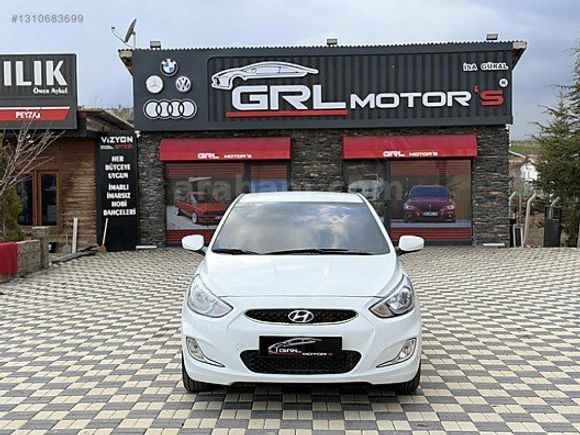 GRL MOTORS'TAN 88.000 ACCENT BLUE