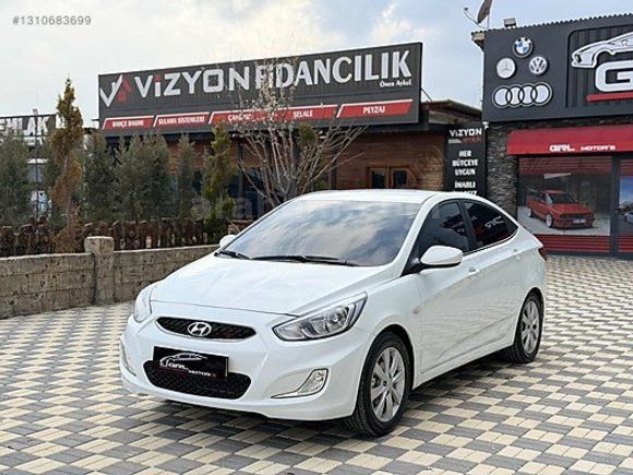 GRL MOTORS'TAN 88.000 ACCENT BLUE