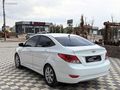 GRL MOTORS'TAN 88.000 ACCENT BLUE