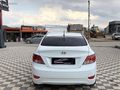 GRL MOTORS'TAN 88.000 ACCENT BLUE